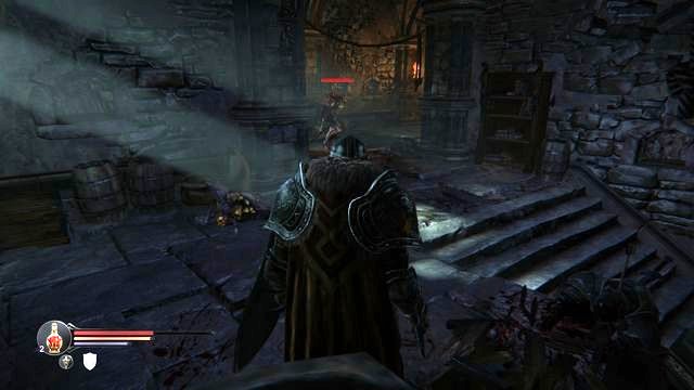 In the location shown in the screenshot, go off the path, down the stairs to the basement and you will obtain the Huge Key [M1 - Find the key for Kaslo | Keystone Citadel - Keystone Citadel - Lords of the Fallen 2014 Game Guide & Walkthrough