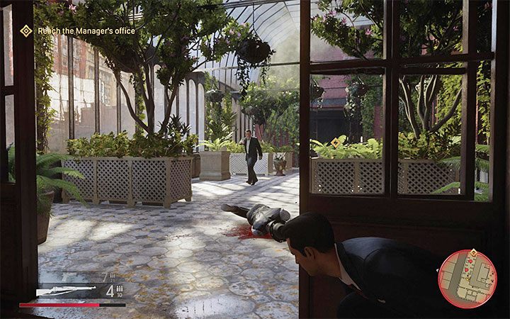 Follow the main corridor, but don't ignore the opportunity to visit the hotel rooms, which may contain First Aid points or ammunition crates - Mafia Definitive Edition: The Saint and the Sinner - walkthrough - Walkthrough - Mafia Definitive Edition Guide, Walkthrough