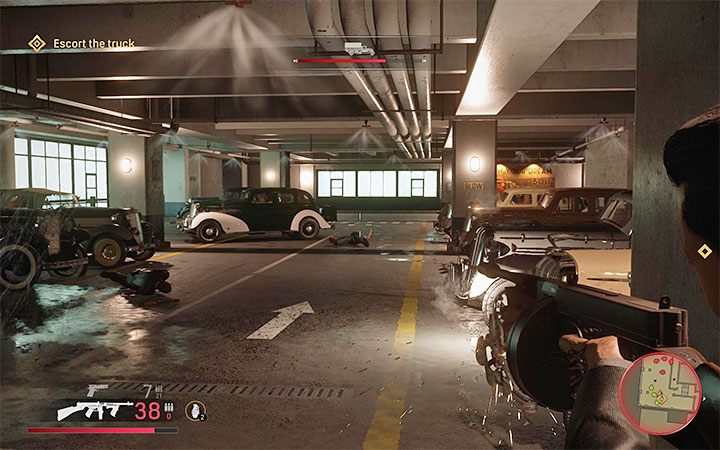Continue to break through into the lower floors of the parking lot and expect to come across even more enemies - Mafia Definitive Edition: Great Deal - walkthrough - Walkthrough - Mafia Definitive Edition Guide, Walkthrough