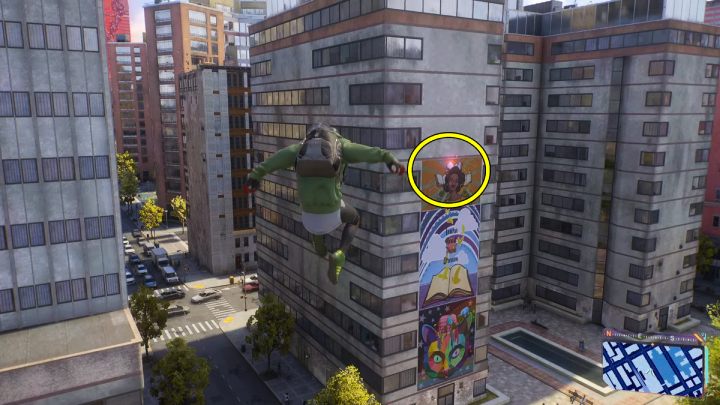 Spider-bot #1 is on the highest billboard on one of the walls of the target building - Spider-Man 2: All Spider-bot locations - Secrets and Collectibles - Spider Man 2 Guide