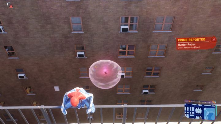 This Spider-bot is on the wall of the marked building - Spider-Man 2: All Spider-bot locations - Secrets and Collectibles - Spider Man 2 Guide