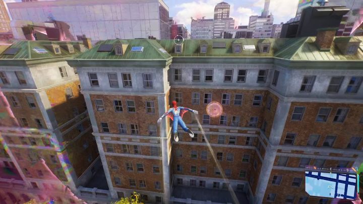 You'll find this Spider-bot on a wall at the back of the target building - Spider-Man 2: All Spider-bot locations - Secrets and Collectibles - Spider Man 2 Guide