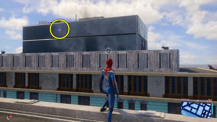 Spider-bot #5 is on the rooftop of the marked building - Spider-Man 2: All Spider-bot locations - Secrets and Collectibles - Spider Man 2 Guide