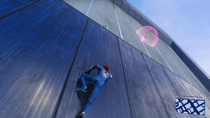 Look for this Spider-bot on one of the walls of the skyscraper - Spider-Man 2: All Spider-bot locations - Secrets and Collectibles - Spider Man 2 Guide