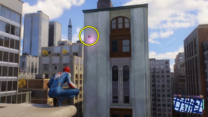 This Spider-bot is found on one of the walls of the target building, near the rooftop - Spider-Man 2: All Spider-bot locations - Secrets and Collectibles - Spider Man 2 Guide