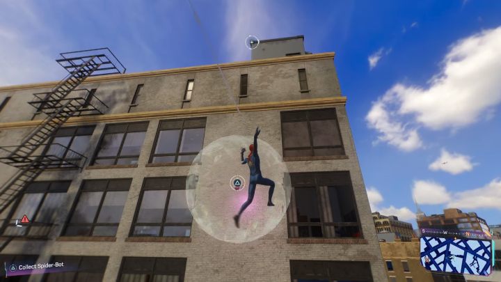 You will find this Spider-bot on one of the walls of the target building - Spider-Man 2: All Spider-bot locations - Secrets and Collectibles - Spider Man 2 Guide