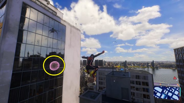 Spider-bot #32 is on the top of the tall skyscraper - Spider-Man 2: All Spider-bot locations - Secrets and Collectibles - Spider Man 2 Guide