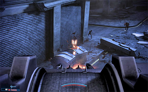 Make your way to a bridge connecting two buildings and get ready for a short action sequence which is about using a stationary turret - Mass Effect 3: Priority, Earth #2 - walkthrough - Main Missions - Mass Effect 3 Guide
