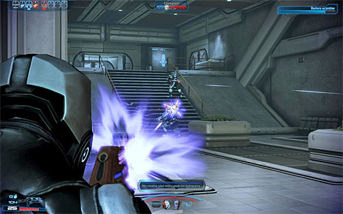 Apart from the Mech, there are also Cerberus soldiers stationed in the room - Mass Effect 3: Grissom Academy: Emergency Evacuation - walkthrough - Missions outside the Citadel - Mass Effect 3 Guide