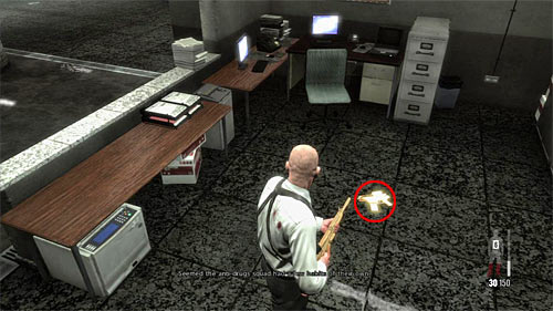 SECRET 10 [Golden Gun - G6 Commando Rifle 2/3]: Behind the desk in small area with elevators and security room - Clues and Golden Guns - Chapter XIII - Collectibles - Max Payne 3 Game Guide & Walkthrough