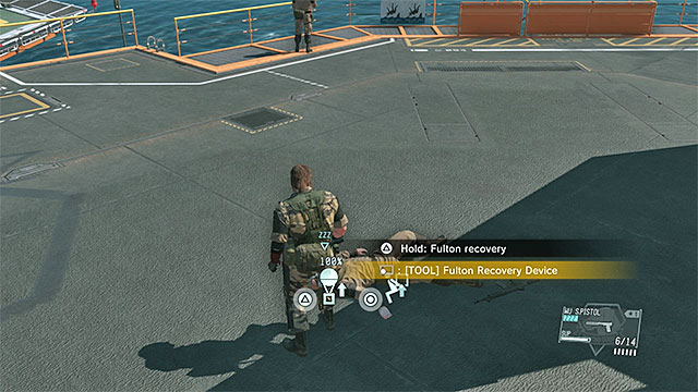 Fulton out the stunned ally (the balloon with a cargo icon) - Completing the basic training on the Mother Base | Walkthrough - Mission 2 - Diamond Dogs - Metal Gear Solid V: The Phantom Pain Game Guide & Walkthrough