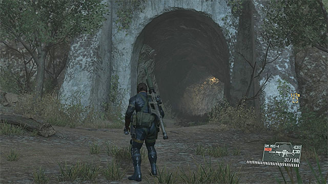 The tunnel leading to the Industrial Zone. - Reaching Ngumba Industrial Zone | Walkthrough - Mission 20 - Voices - Metal Gear Solid V: The Phantom Pain Game Guide & Walkthrough