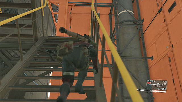 Get to the stairs and go to the upper part of the R&D platform - Eliminating the enemy commander | Walkthrough - Mission 22 - Retake the Platform - Metal Gear Solid V: The Phantom Pain Game Guide & Walkthrough