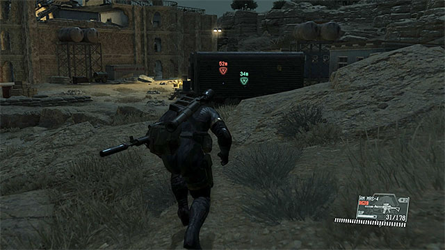 The cage with the prisoner. - Extracting the prisoners and enemy patrol | Walkthrough - Mission 9 - Backup, Back Down - Metal Gear Solid V: The Phantom Pain Game Guide & Walkthrough