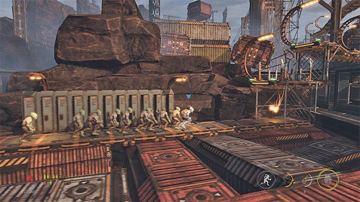 Soon, you will reach an area patrolled by the big smile machine - Oddworld Soulstorm: Reaching the Security Station by crane - walkthrough - 15: The Yards - Oddworld Soulstorm Guide