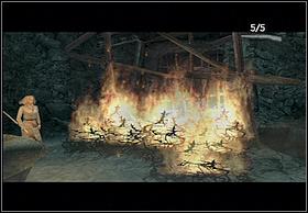 Pick up the spear embedded in the ground near the fire and light it up - Necropolis - Walkthrough - Peter Jacksons King Kong - Game Guide and Walkthrough