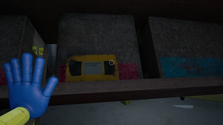 At the bottom you will also find a yellow tape, which is a completely optional collectible - Poppy Playtime: Red Hand - walkthrough - Chapter 1 - Poppy Playtime Guide, Walkthrough