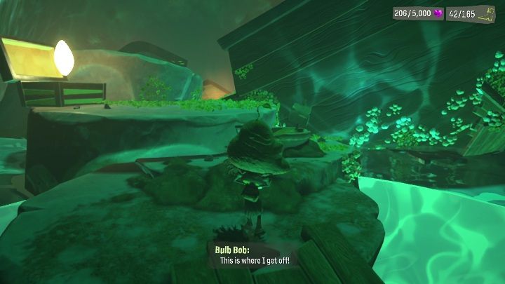 The next step is placing the head in an indicated spot and trying to take an item with strong light coming out of it - Psychonauts 2: Bobs Bottles - walkthrough - Walkthrough - Psychonauts 2 Guide