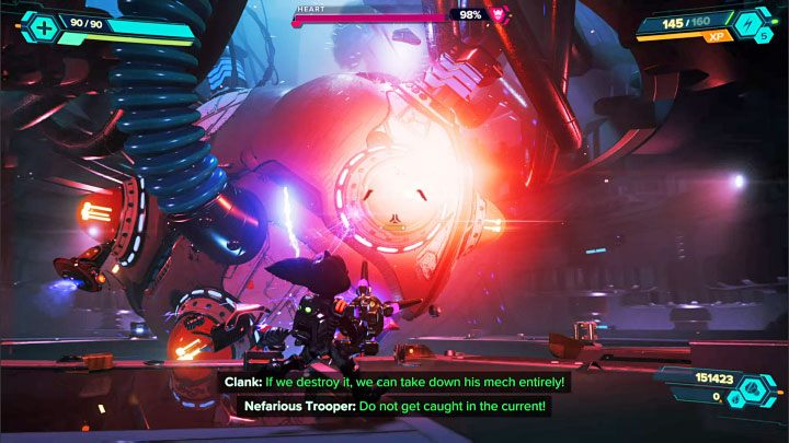 The second battle will take place next to the large mechanical heart of an Imperial Power Suit - Ratchet & Clank Rift Apart: Emperor Nefarious, the final boss - how to defeat him? - Bosses - Ratchet & Clank Rift Apart Guide