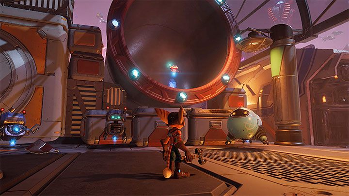 You can find the Spybot on your first visit to Nefarious City - Ratchet & Clank Rift Apart: RYNO, the ultimate weapon - Spyobots list - Secrets and Collectibles - Ratchet & Clank Rift Apart Guide