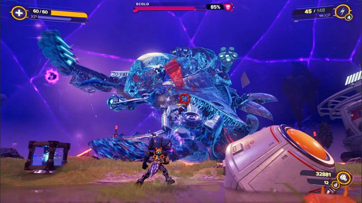 Use your strongest weapons to attack the boss, though it can also be helpful to use the Lightning Bolt, for example, which is able to temporarily hinder Scolo's attacks - Ratchet & Clank Rift Apart: Scolo the Seekerpede, Scarstu Debris Field - Bosses - Ratchet & Clank Rift Apart Guide