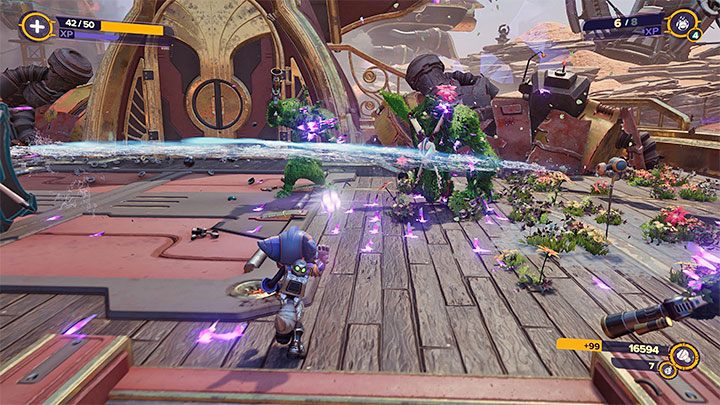 Opponents hit by the Sprinkler are temporarily turned into plants - quickly switch to another weapon or run up to them and attack with a melee weapon - Ratchet & Clank Rift Apart: Trophies - List - Appendix - Ratchet & Clank Rift Apart Guide