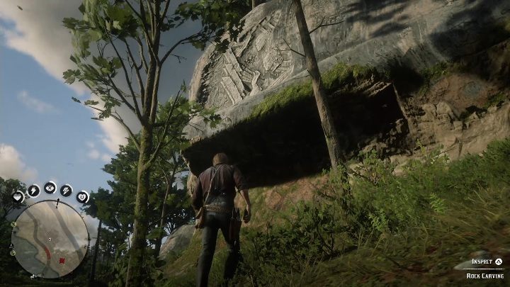 This Carving is visible from the path - Red Dead Redemption 2: Rock carvings - where to find all of them? Maps - Red Dead Redemption 2: Dinosaur bones and Rock Carvings - Red Dead Redemption 2 Guide