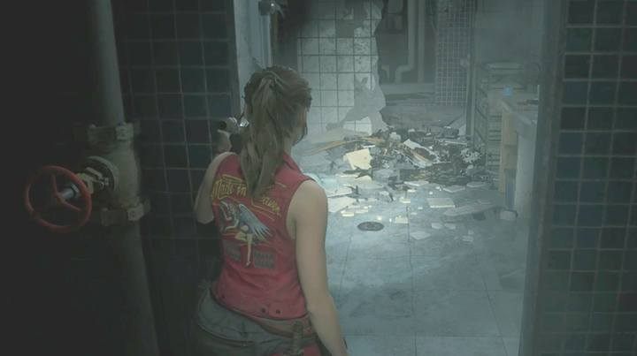 Head to the staircase in the north-west part of the building - Collect 3 medallions task | Police station in Resident Evil 2 - Walkthrough - Resident Evil 2 Guide
