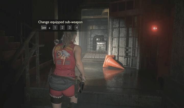 Go through the door on the bottom floor. - Undergrounds and the first boss | Police station in Resident Evil 2 - Walkthrough - Resident Evil 2 Guide