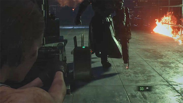 The second option is to shoot generators that can electrocute and stun Nemesis - Resident Evil 3: Nemesis - Demolition Site boss fight - Nemesis boss fights - Resident Evil 3 Guide