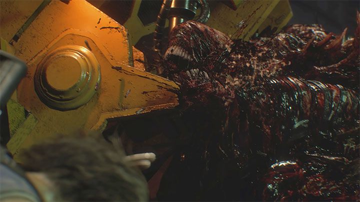 Continue using the grenade launcher, magnum, shotgun and shrapnel grenades to weaken Nemesis - Resident Evil 3: Nemesis - NEST 2 boss fight - Nemesis boss fights - Resident Evil 3 Guide