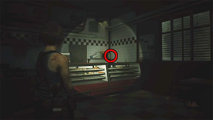 The figurine can be found inside the Donut Shop - Resident Evil 3: Downtown secrets, collectibles - Collectibles and secrets - Resident Evil 3 Guide