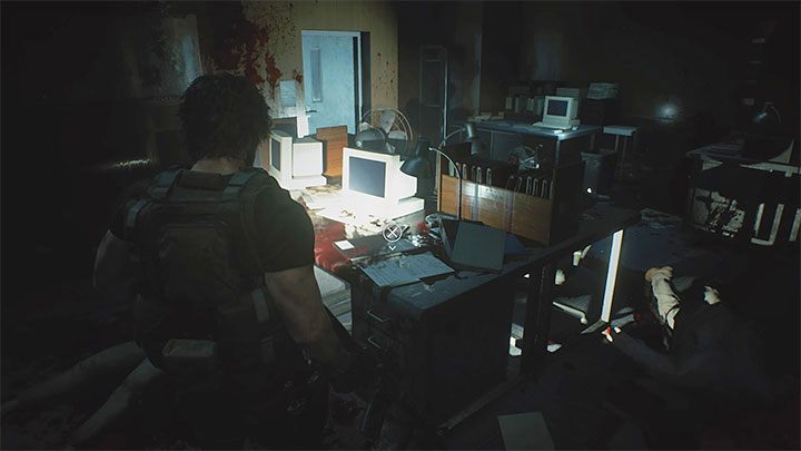 The journal lies on a bloodstained desk next to the computer in the Staff Room on the 2F of the Hospital - Resident Evil 3: Hospital secrets, collectibles - Collectibles and secrets - Resident Evil 3 Guide