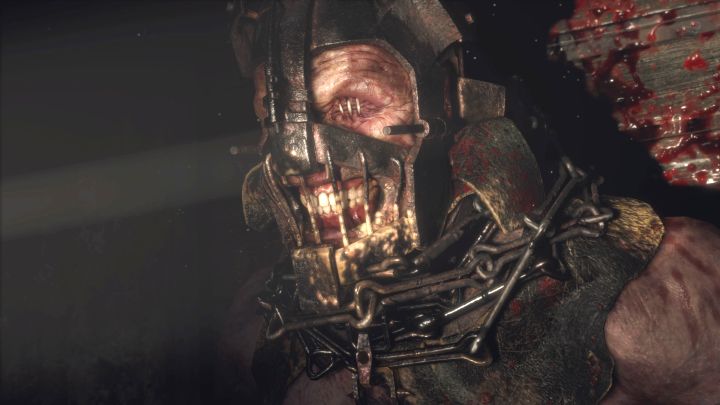 After collecting the key, both heroes will fall down through the floor to the dungeon where you encounter Garrador - Resident Evil 4 Remake: How to defeat Garrador boss? - Bosses - Resident Evil 4 Remake Guide