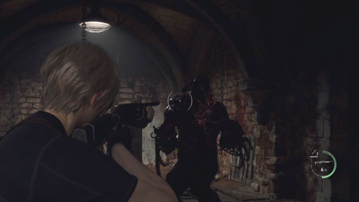 To deal any damage to the boss, you need to hit a weak point on his back (we show it in the attached screenshot) - Resident Evil 4 Remake: How to defeat Garrador boss? - Bosses - Resident Evil 4 Remake Guide