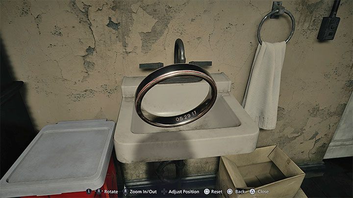 Select the ring from the inventory to Examine it - Resident Evil Village: House Beneviento, Doll Woman - Puzzle solutions - Resident Evil Village Guide