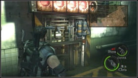 When all green lights shine, catch (you or your partner) a flame thrower and pour fire over the boss - Experimental Facility - Walkthrough - Resident Evil 5 - Game Guide and Walkthrough