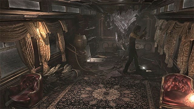 Panel Opener is lying on the ground in the place where you fought the scorpion - Continuation of the train exploration | Ecliptic Express Train Walkthrough - Ecliptic Express Train - Resident Evil Zero HD Game Guide & Walkthrough