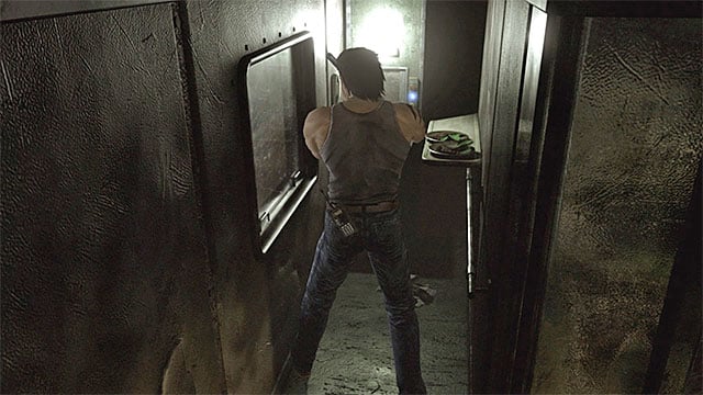 Find the lift on the lower floor of the car (while playing as Billy) - The start of the cooperation with Billy | Ecliptic Express Train Walkthrough - Ecliptic Express Train - Resident Evil Zero HD Game Guide & Walkthrough