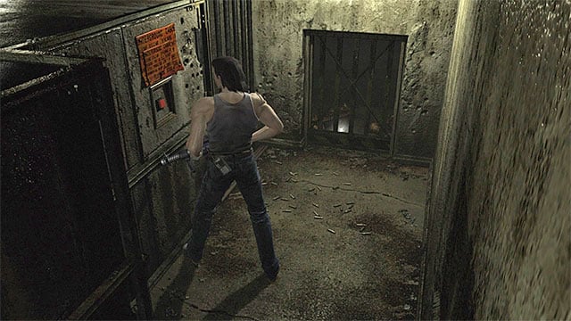 Switch to Billy, make sure that you have equipped the grenade launcher and approach the red button shown in the above screenshot - Exploring the testing area | Training Facility Basement Walkthrough - Training Facility Basement - Resident Evil Zero HD Game Guide & Walkthrough