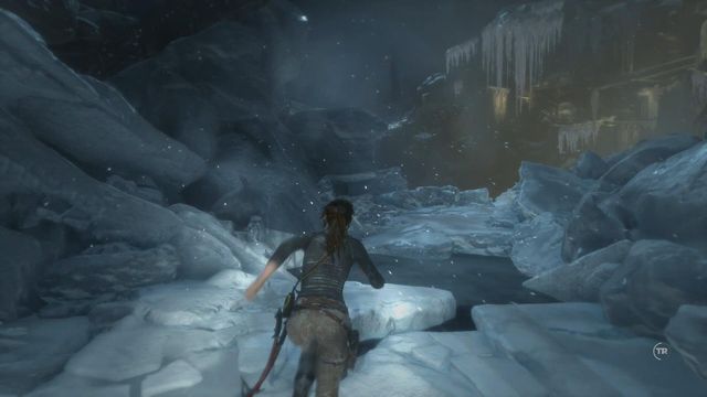 Once you exit the water, the chopper is still firing at you - Rise of the Tomb Raider: Survive the freezing waters, walkthrough - Fugitive - Rise of the Tomb Raider Guide