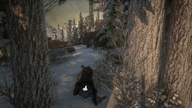 In the forest, past the skating rink, close to the vehicles at the edge, at the tree - Rise of the Tomb Raider: Survival Caches, Research Base secrets, locations, tips - Research Base - Rise of the Tomb Raider Guide