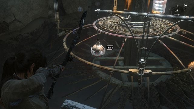 While standing on the edge of the ground, fire at the first orb wound with rope and Lara will turn the first balance beam by 90 degrees - Rise of the Tomb Raider: Open the entrance to Kitezh, walkthrough - Path of the Deathless - Rise of the Tomb Raider Guide