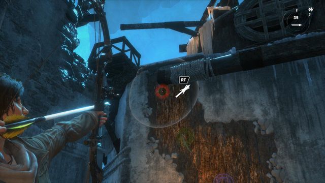 Use bow to drive three arrows into the wooden surface of the structure, just like in the screenshot - Rise of the Tomb Raider: Find a way to destroy the gate, walkthrough - Gate Crasher - Rise of the Tomb Raider Guide