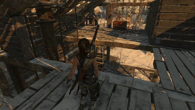 At the upper level of the wooden building - Rise of the Tomb Raider: Chests, crypt treasures, Soviet Installation secrets - Soviet Installation - Rise of the Tomb Raider Guide