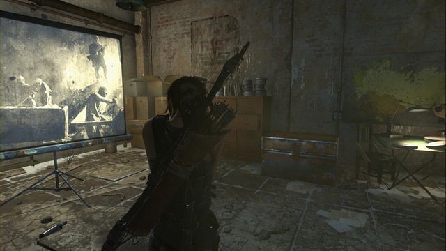 At the bottom level of the jail, in the room with the projector - Rise of the Tomb Raider: Chests, crypt treasures, Soviet Installation secrets - Soviet Installation - Rise of the Tomb Raider Guide