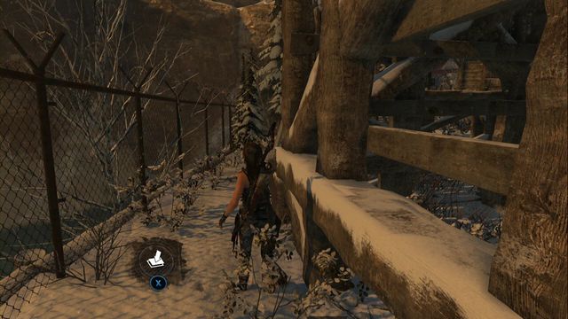 Right next to the fence, behind the watchtower - Rise of the Tomb Raider: Chests, crypt treasures, Soviet Installation secrets - Soviet Installation - Rise of the Tomb Raider Guide