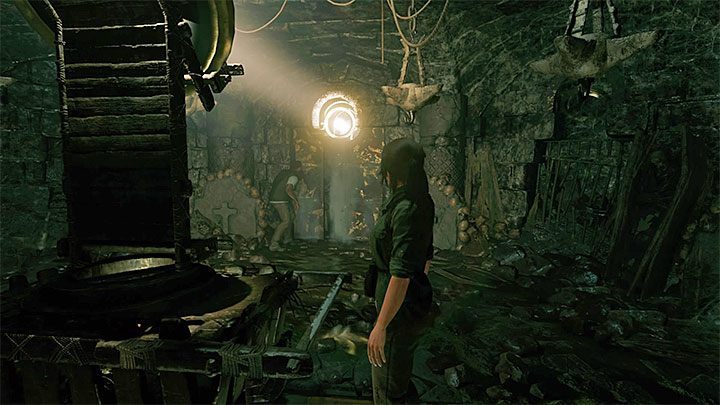 Move the cart towards the hole in the ceiling, the one through which the light comes in - How to solve the way of the cross puzzle beneath the library in San Juan? - Solving Riddles - Shadow of the Tomb Raider Game Guide