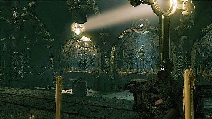Reach the spinning wheel located on the right from the entrance to the room with the cross - How to solve the way of the cross puzzle beneath the library in San Juan? - Solving Riddles - Shadow of the Tomb Raider Game Guide