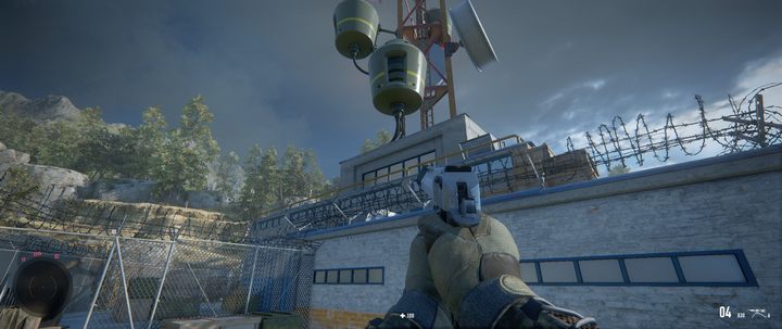 You can easily disable the last booth at the back of the building - Sniper Ghost Warrior Contracts 2 Guide